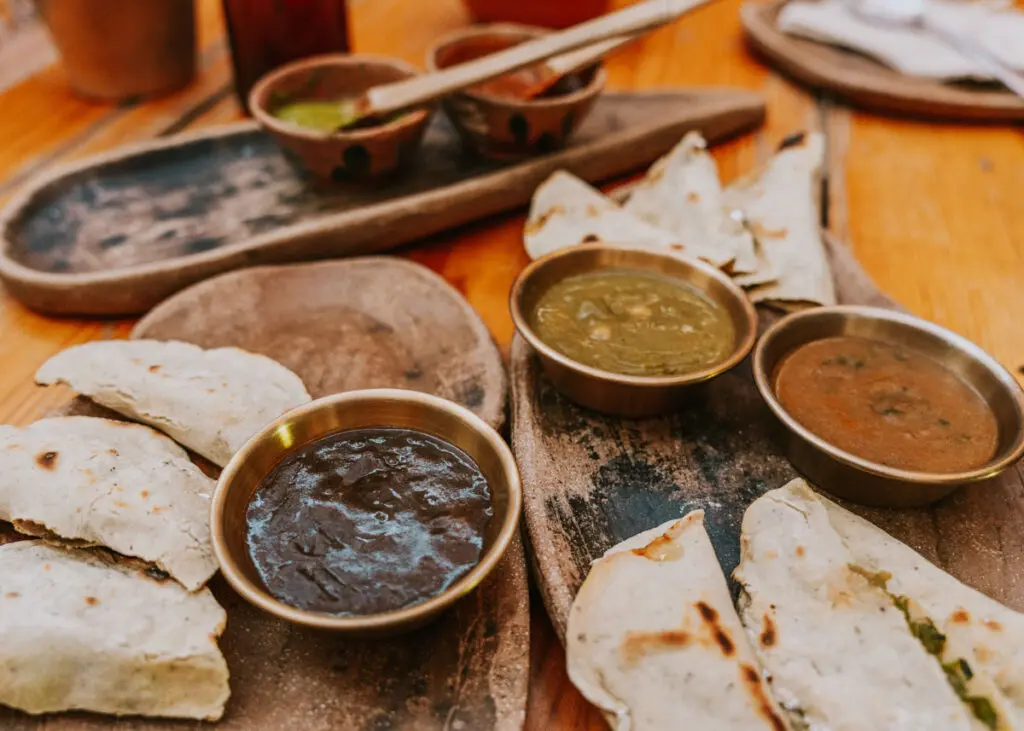 Three small bowls of mole at Hierba Dulce, a must add to any Oaxaca City itinerary