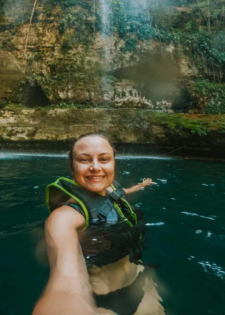 Swimming in a cenote between Valladolid and Chichén Itzá, a must-add to your Chichén Itzá itinerary!
