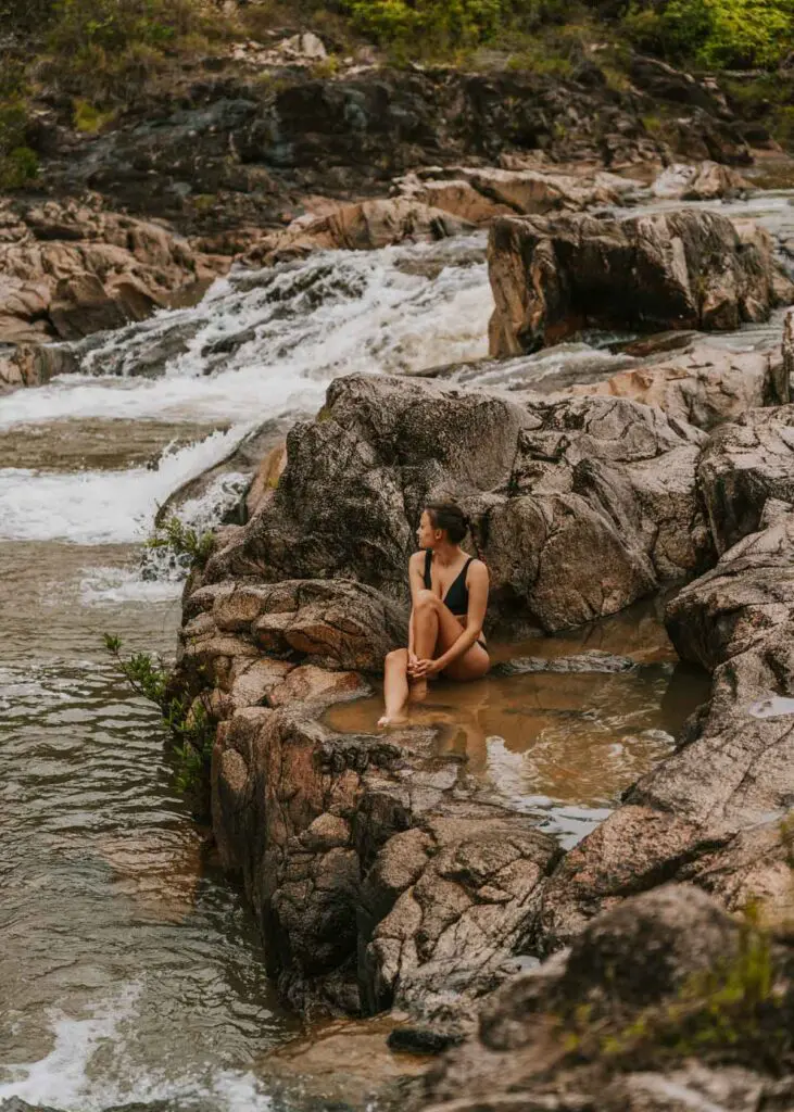 Woman in natural pool at Rio On Pools in Belize