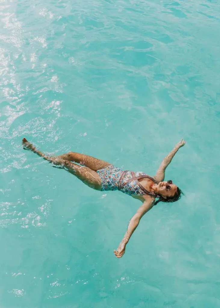 Floating in the lagoon of seven colors in Bacalar, Mexico
