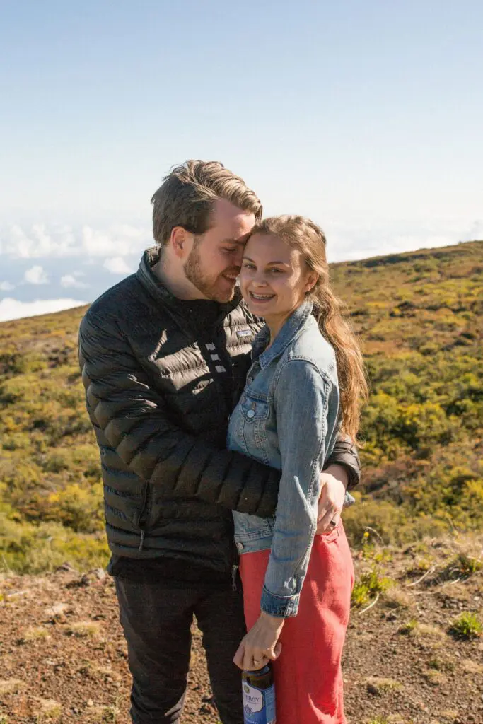Couple at Haleakalā volcano, an example of what to wear in Maui