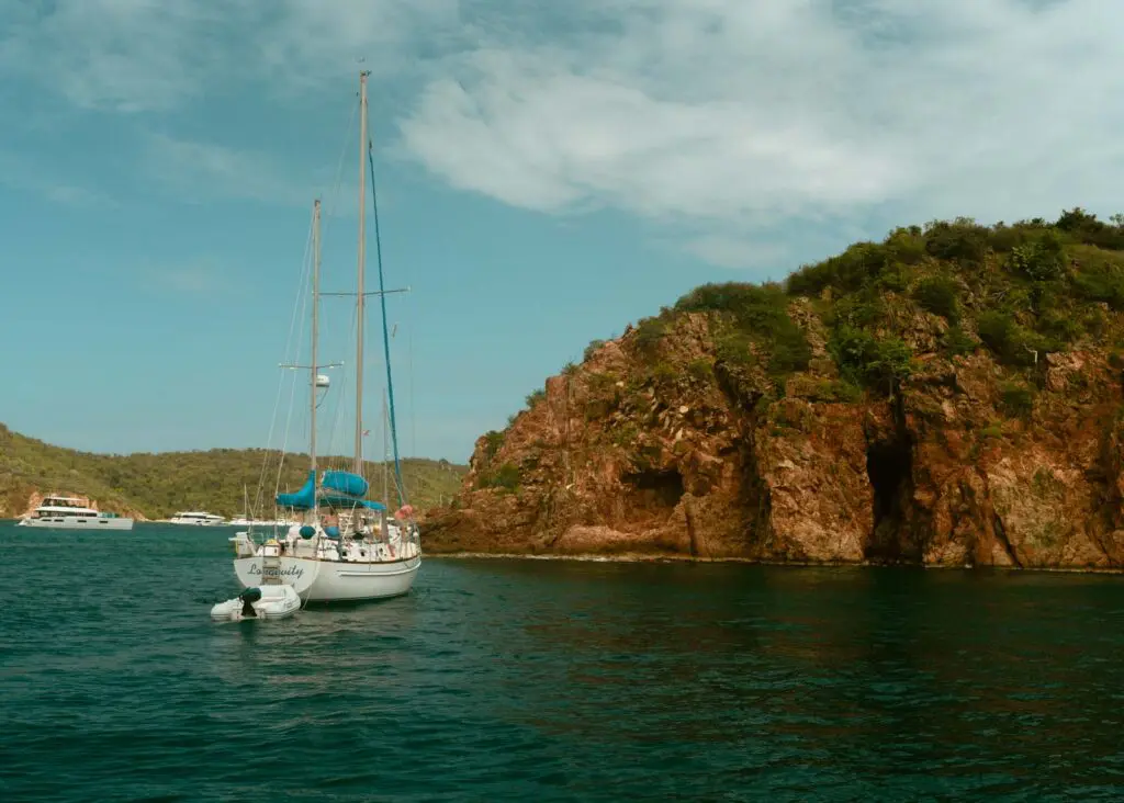 Sailboat near Norman Island, one of the best places to visit with a day in Tortola as a cruise ship passenger