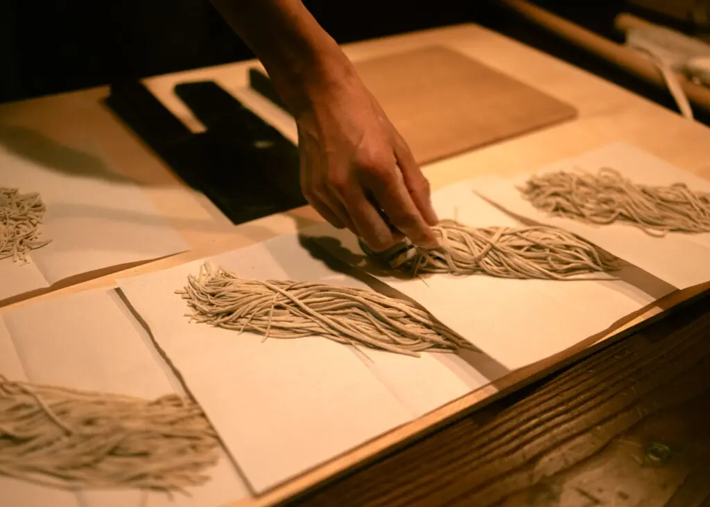 Making soba noodles from scratch at our countryside stay in Japan