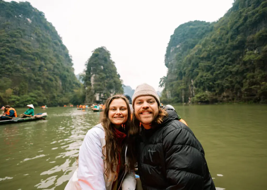 On a boat tour through Trang An in Ninh Binh, Vietnam