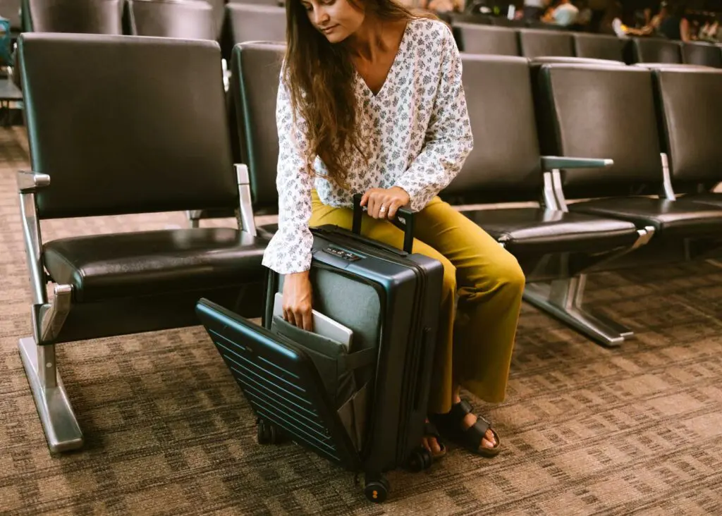 Storing my laptop in my suitcase at the airport