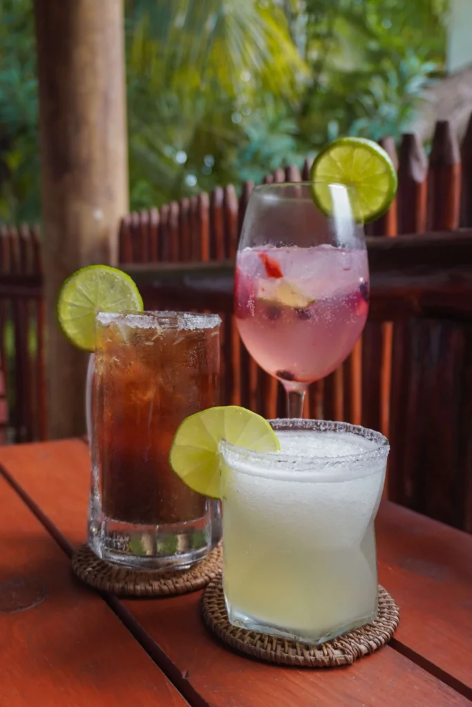 Three cocktails at Hotel Boutique Aurea, one of the best boutique hotels on the water in Bacalar, Mexico