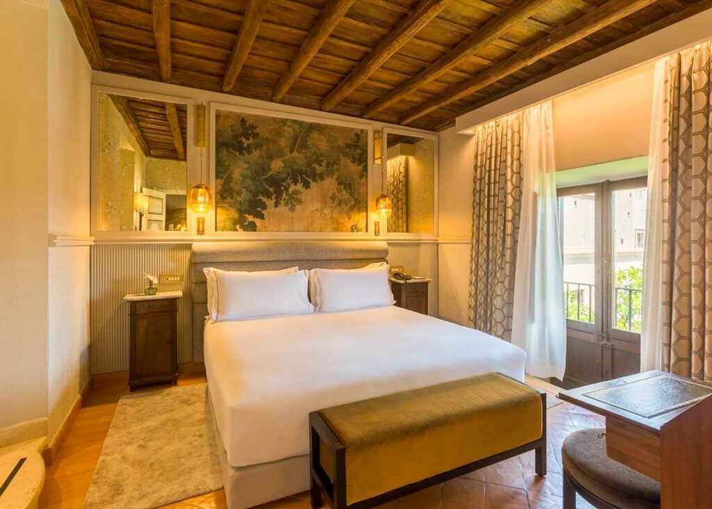 Bedroom at Donna Camilla Savelli, a converted Baroque monetary that is now a hotel in Trastevere, Rome